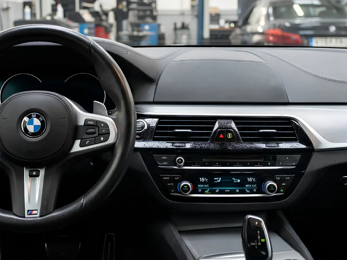 BMW dashboard and climate controls after an AC service